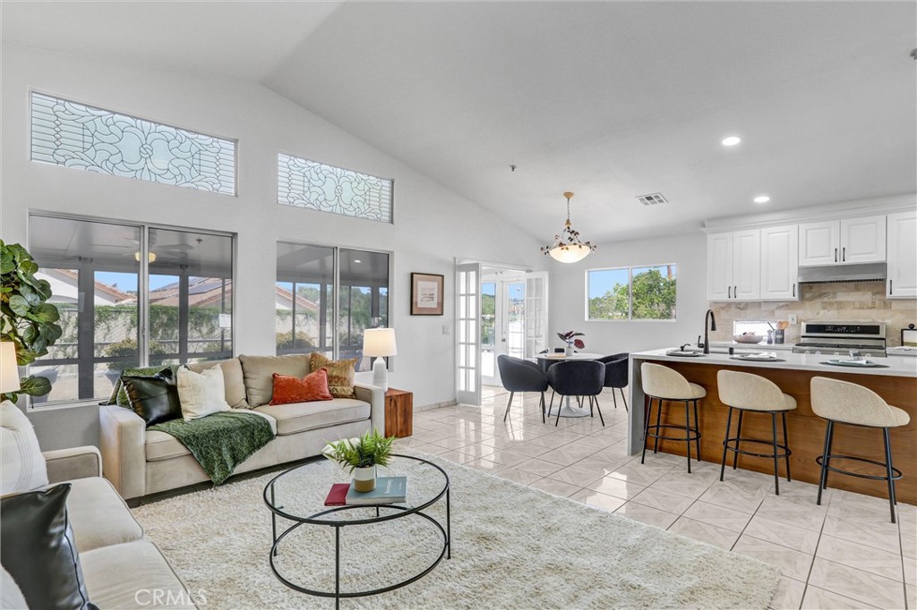 3324 Monique Lane Spring Valley, CA 91977 - Photo 11 of 32 Family Room, Dining Area, and Kitchen