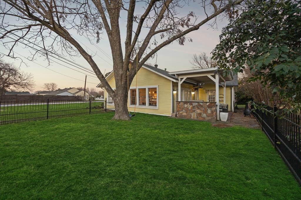 704 Williams Street Rockwall, TX 75087 - Photo 30 of 39 a view of a house with backyard