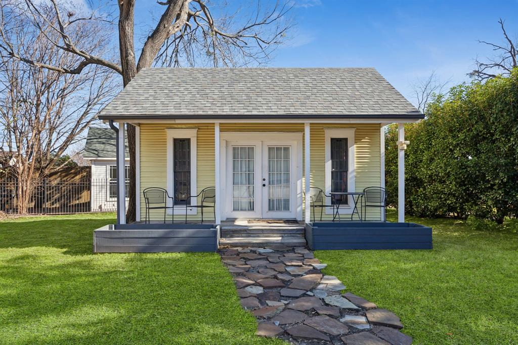 704 Williams Street Rockwall, TX 75087 - Photo 34 of 39 a front view of a house with a yard