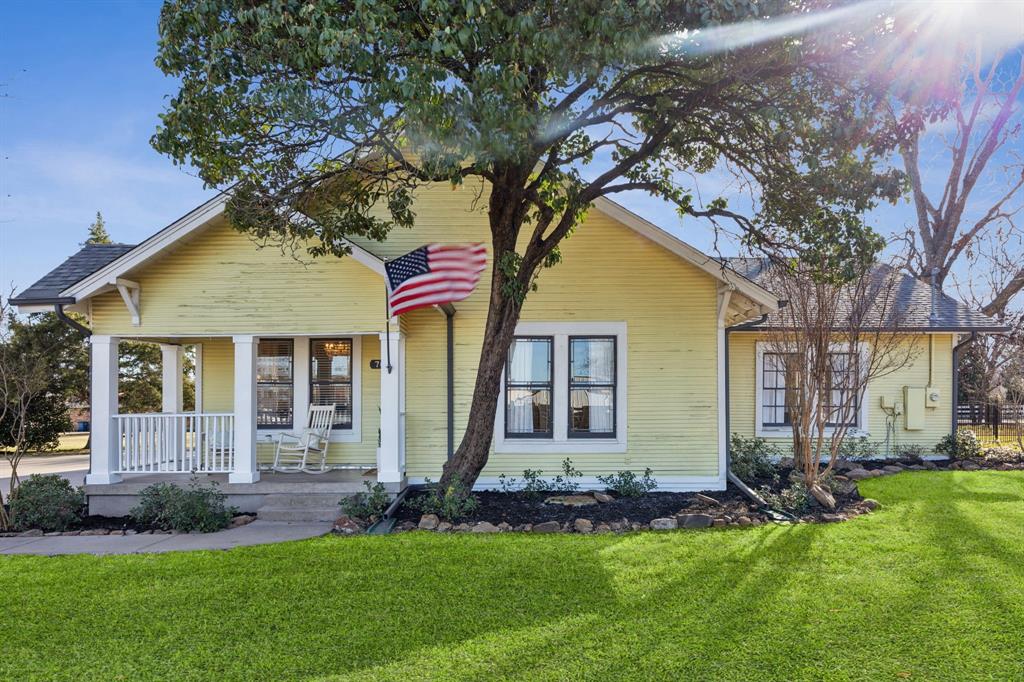 704 Williams Street Rockwall, TX 75087 - Photo 37 of 39 front view of house with a yard