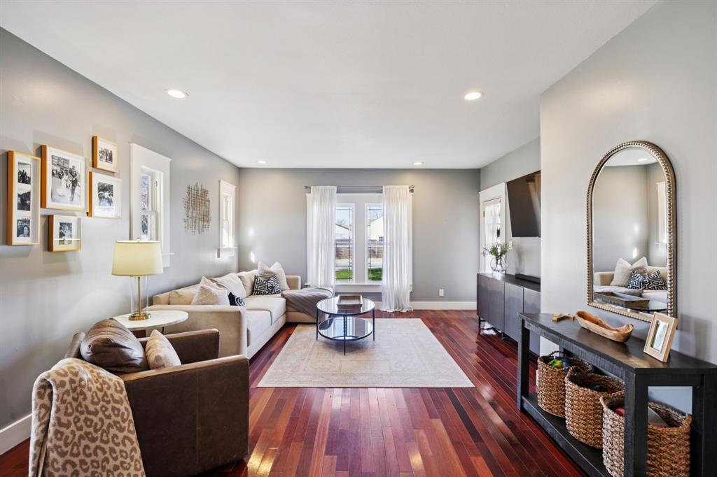 704 Williams Street Rockwall, TX 75087 - Photo 6 of 39 a living room with furniture and wooden floor