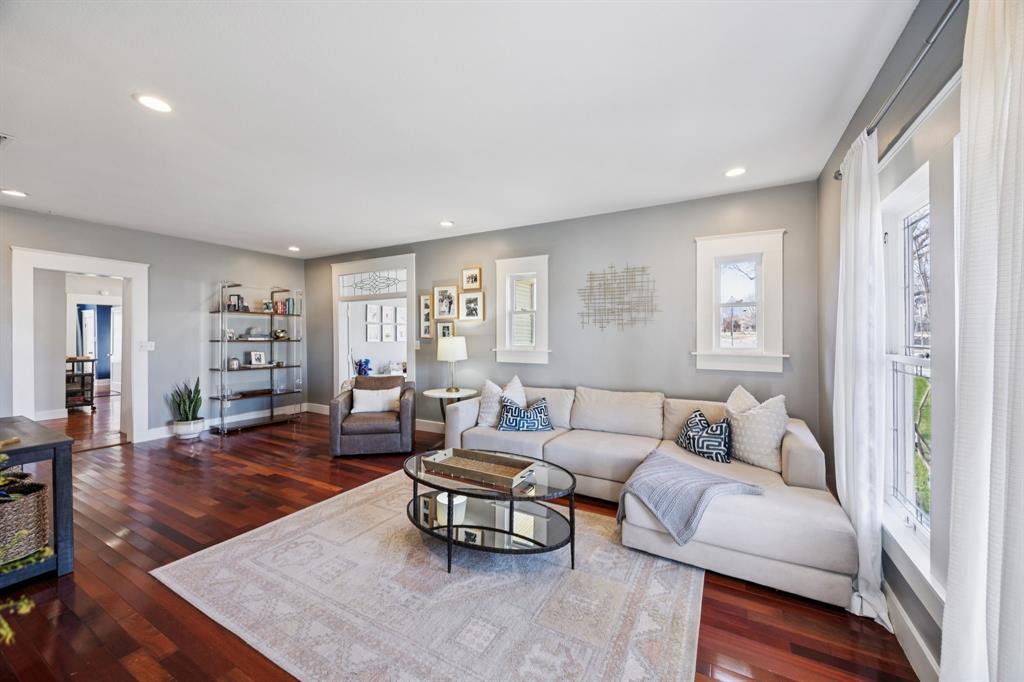 704 Williams Street Rockwall, TX 75087 - Photo 7 of 39 a living room with furniture and wooden floor