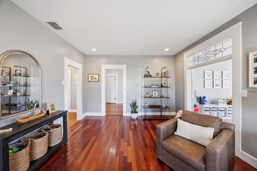 704 Williams Street Rockwall, TX 75087 - Photo 8 of 39 a living room with furniture and wooden floor