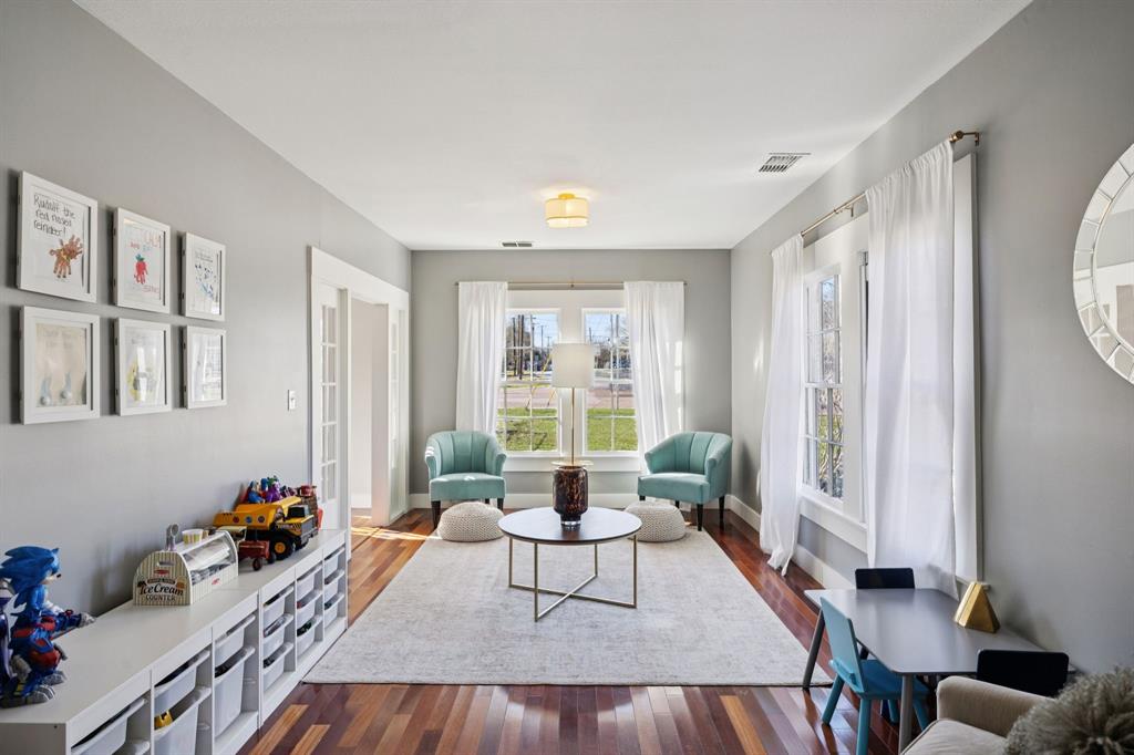 704 Williams Street Rockwall, TX 75087 - Photo 10 of 39 a living room with furniture and a large window