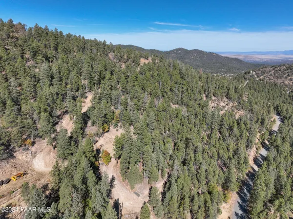 a view of mountain view with lots of trees