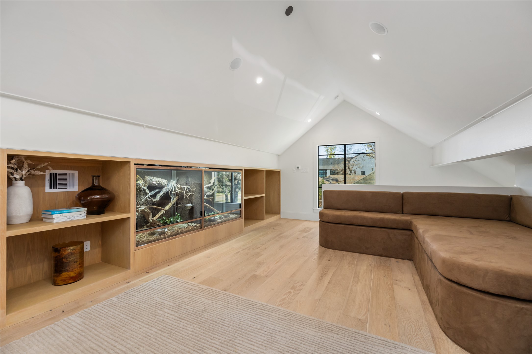 419 West 30th Street Houston, TX 77018 - Photo 39 of 45 a living room with furniture and a floor to ceiling window
