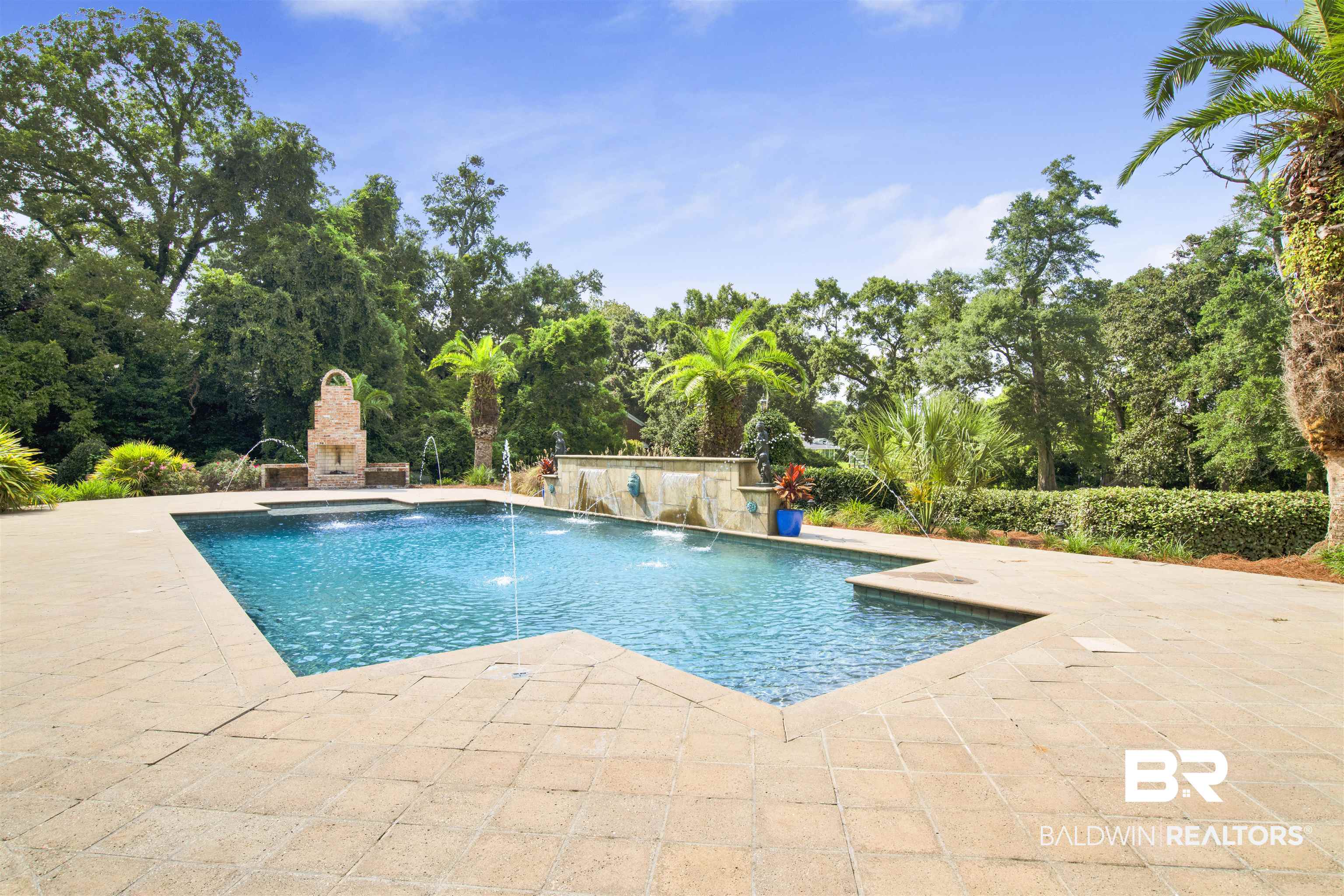 3816 Austill Lane Mobile, AL 36608 - Photo 64 of 80 Outdoor pool with a patio and an outdoor stone fireplace