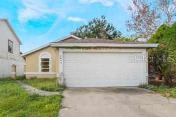 a front view of house with yard