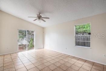 1032 Inkberry Court Orlando, FL 32811 - Photo 16 of 16 a view of an empty room with a window