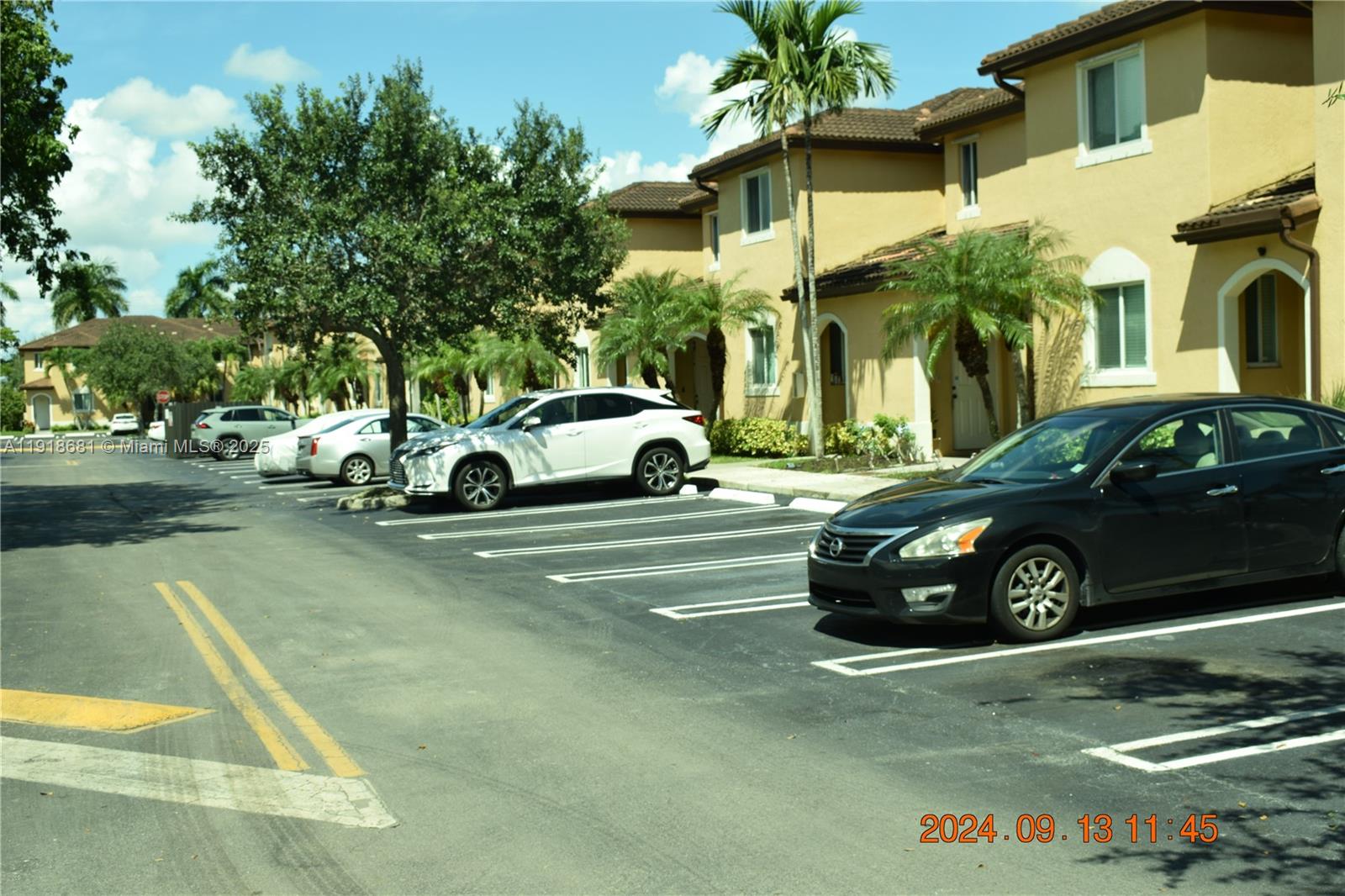 a view of a car in front of a house