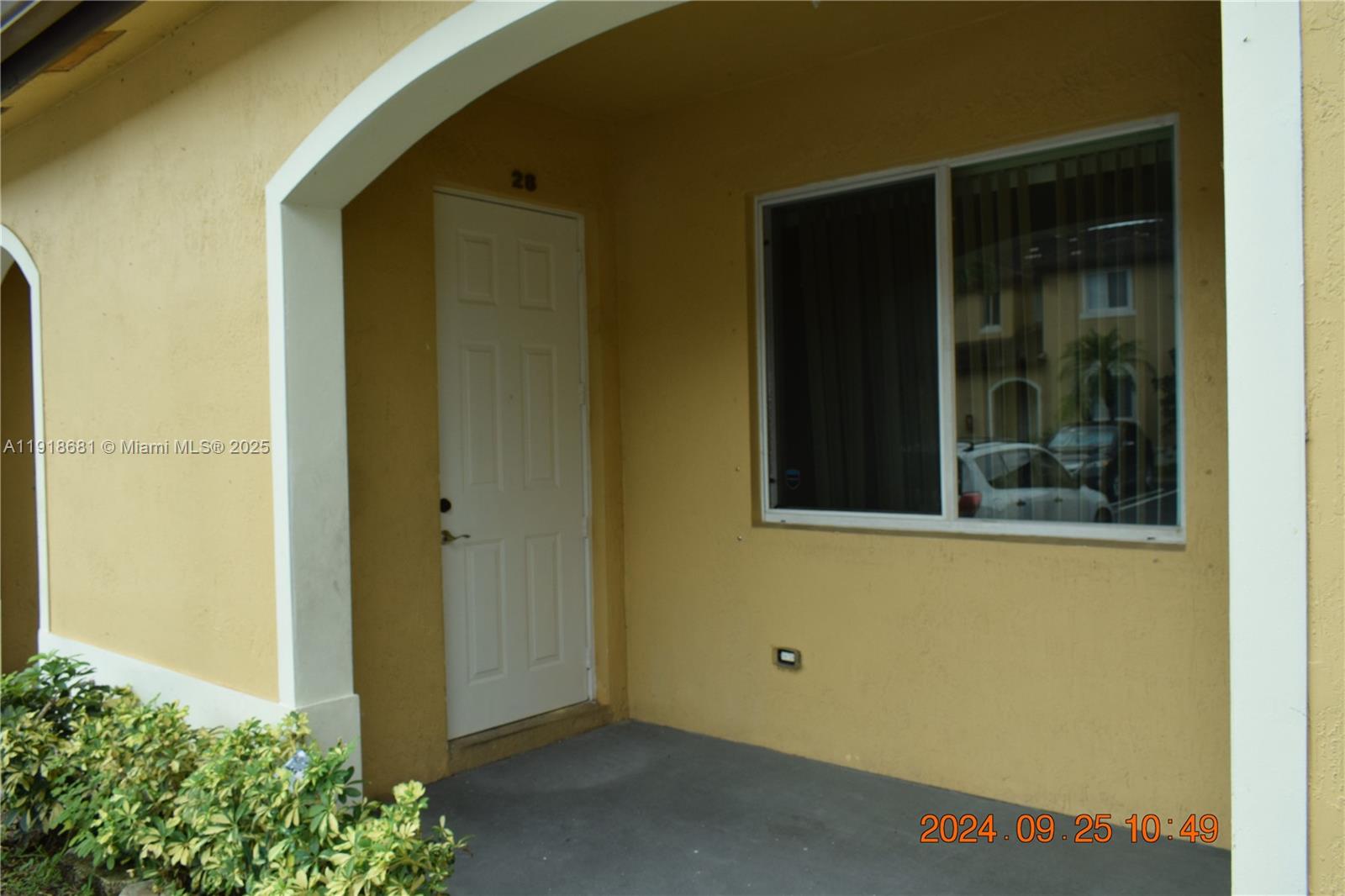 12080 Southwest 268th Street, Unit 28 Homestead, FL 33032 - Photo 3 of 25 a view of a door