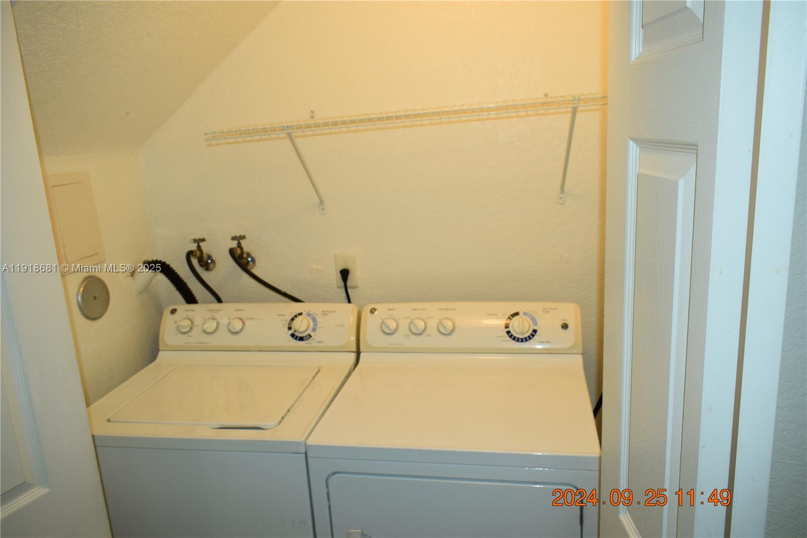 12080 Southwest 268th Street, Unit 28 Homestead, FL 33032 - Photo 10 of 25 a utility room with dryer and washer
