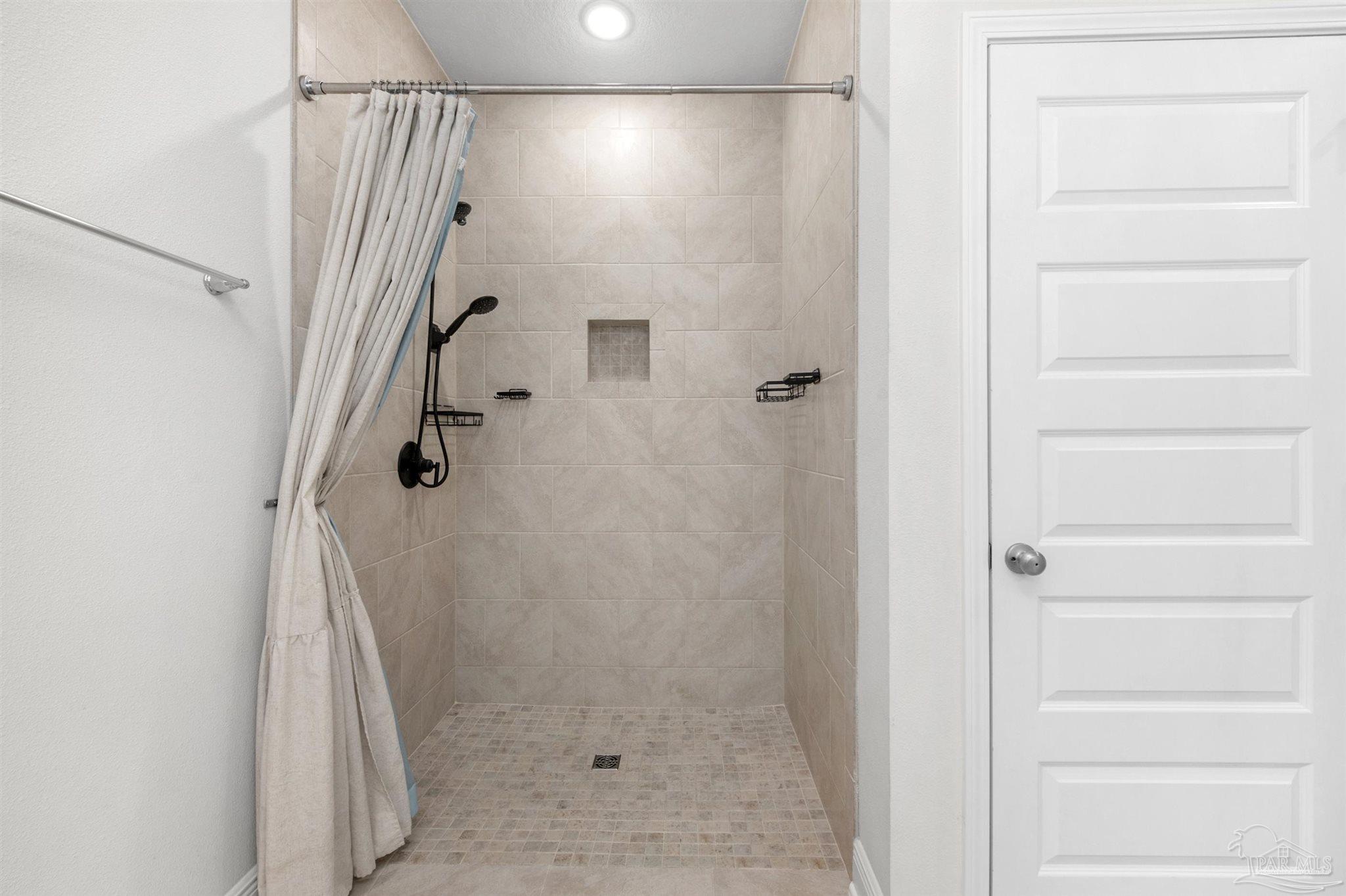 7814 Burnside Loop Pensacola, FL 32526 - Photo 34 of 41 a bathroom with a shower