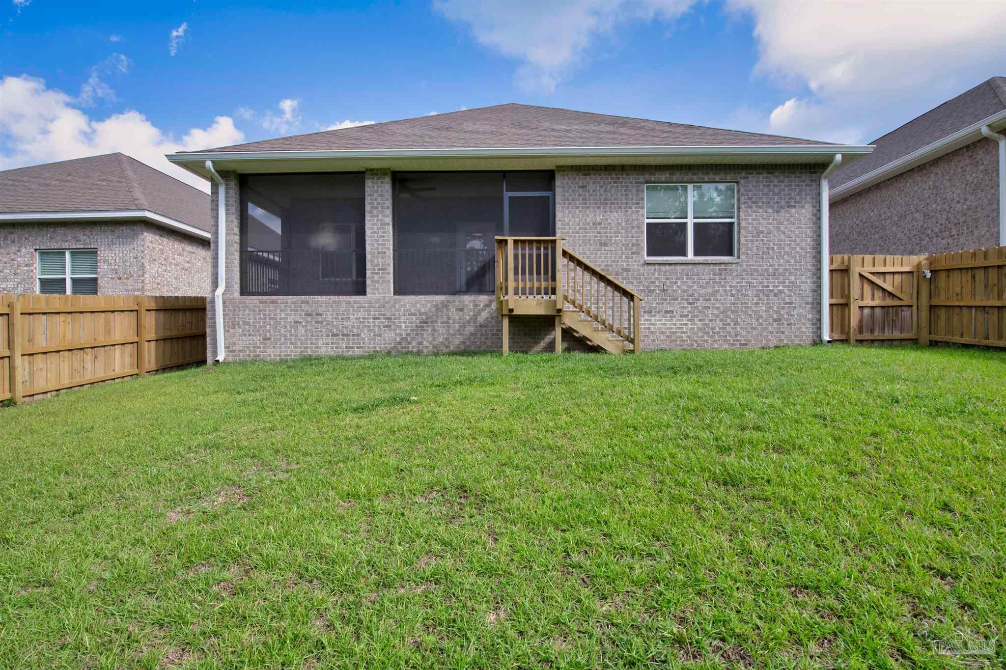 7814 Burnside Loop Pensacola, FL 32526 - Photo 40 of 41 a view of a house with a yard and a large tree