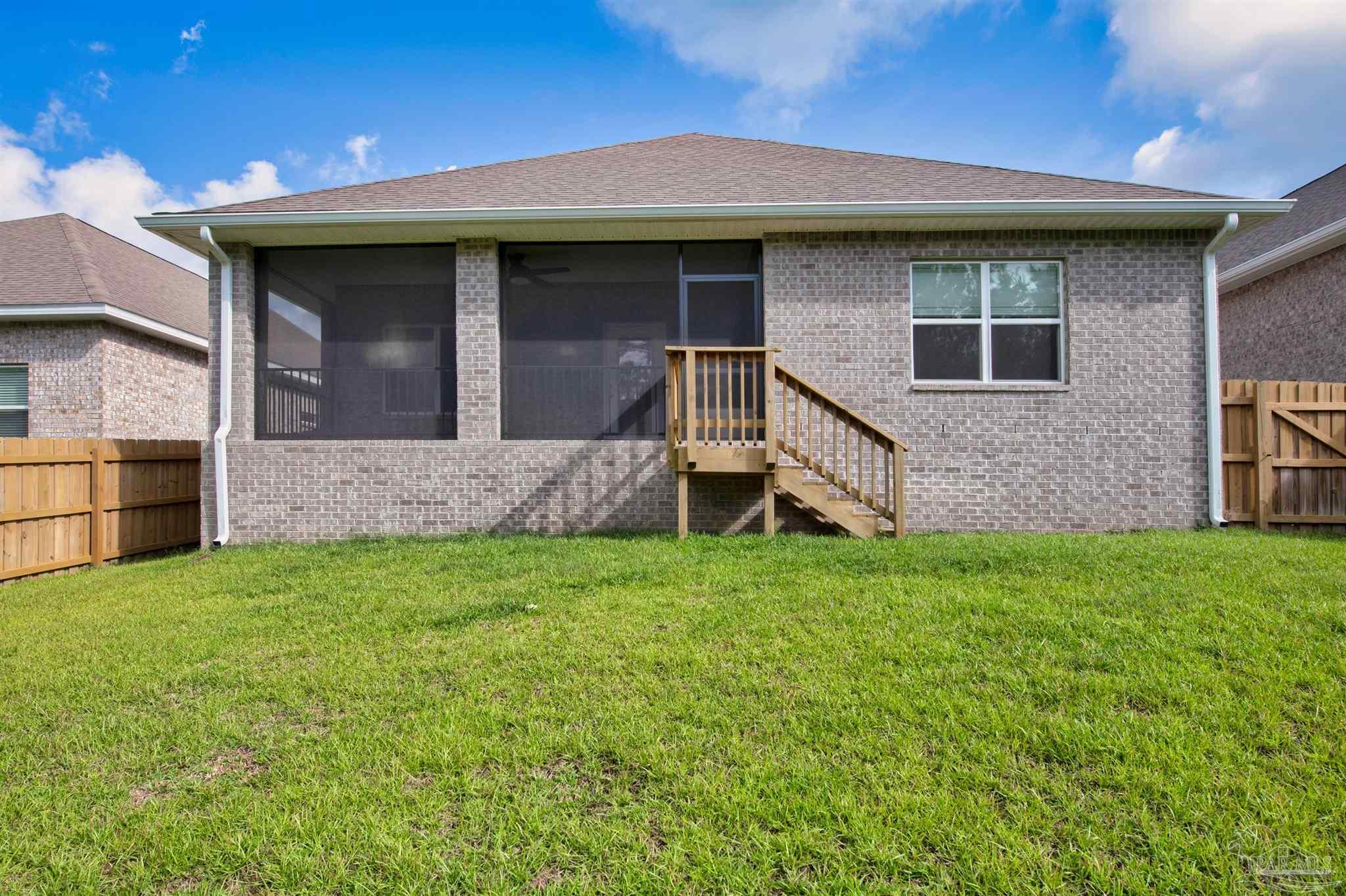 7814 Burnside Loop Pensacola, FL 32526 - Photo 41 of 41 a front view of a house with a yard