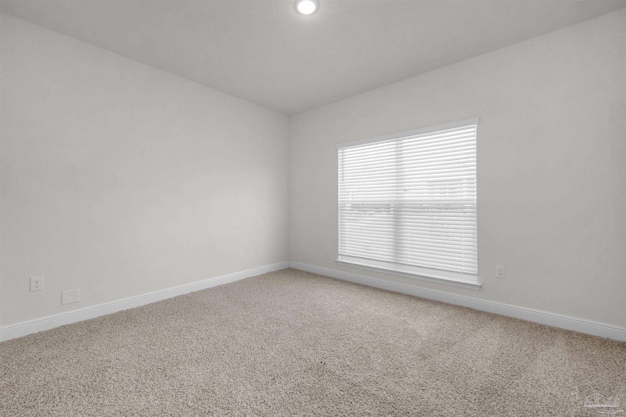 7814 Burnside Loop Pensacola, FL 32526 - Photo 6 of 41 an empty room with a window