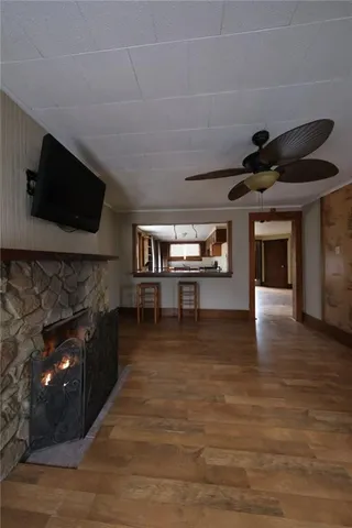 a view of a livingroom with furniture and window