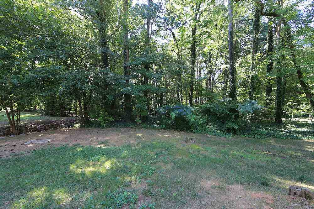 1506 Edgeside Court Raleigh, NC 27609 - Photo 19 of 23 Backyard