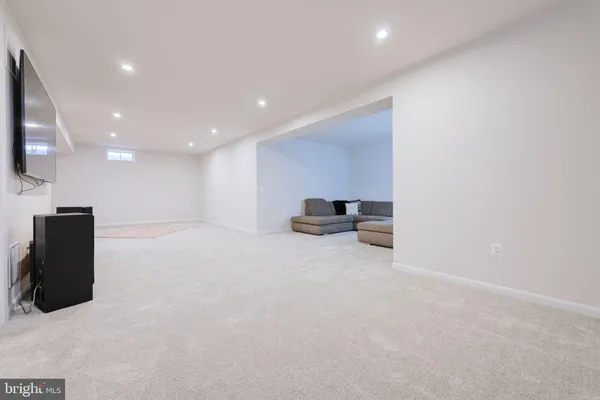 a view of room with a flat screen tv
