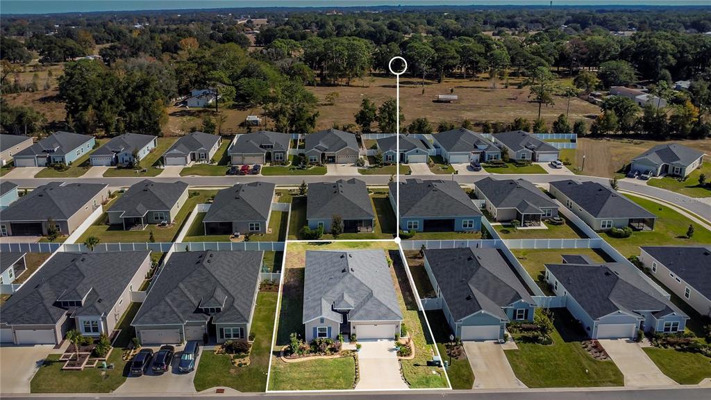 7507 Southwest 76th Terrace Ocala, FL 34476 - Photo 21 of 22 an aerial view of houses with outdoor space