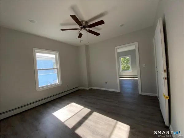 a view of an empty room and window