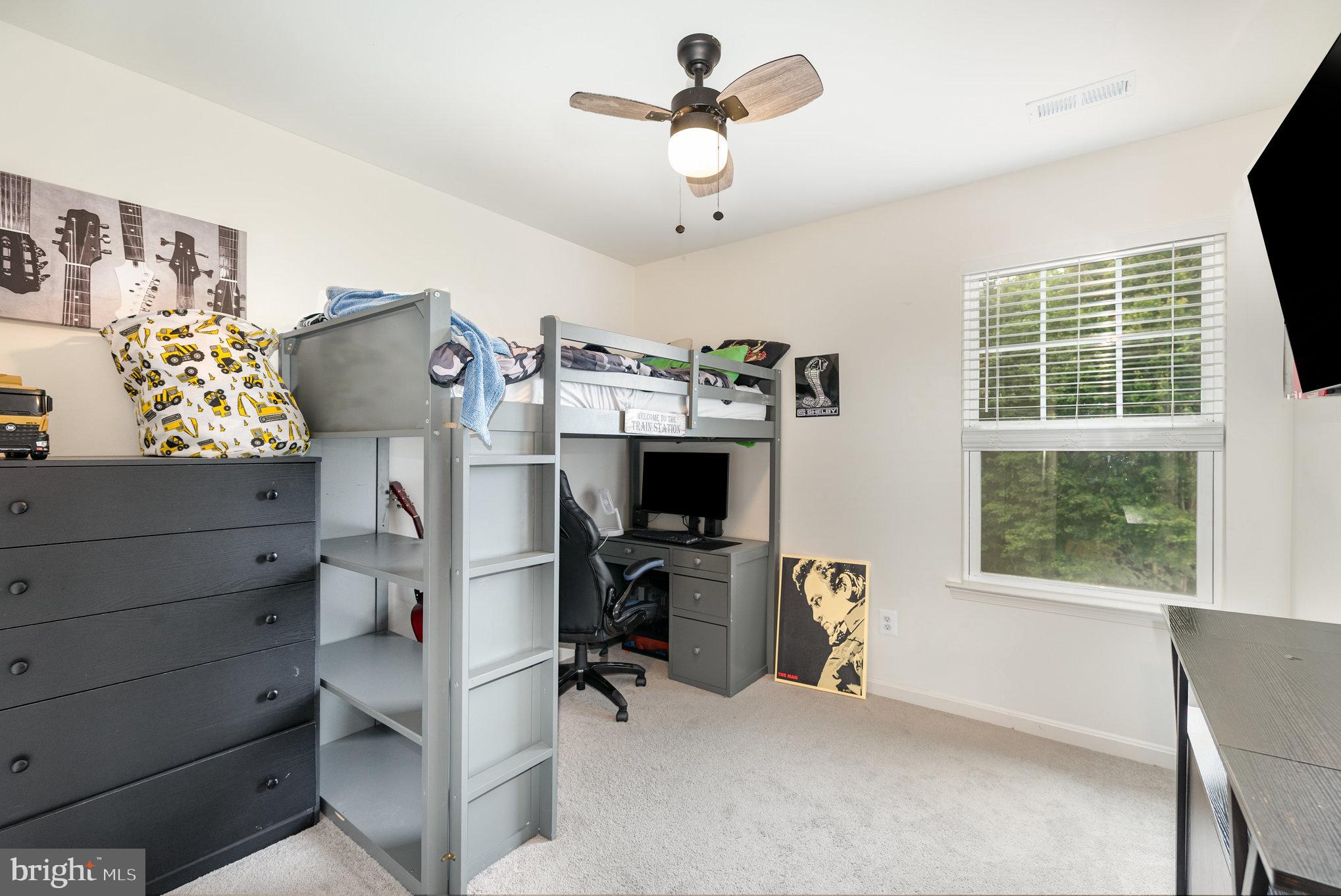 105 Maple Leaf Drive Rising Sun, MD 21911 - Photo 17 of 31 a view of a workspace with furniture and a window