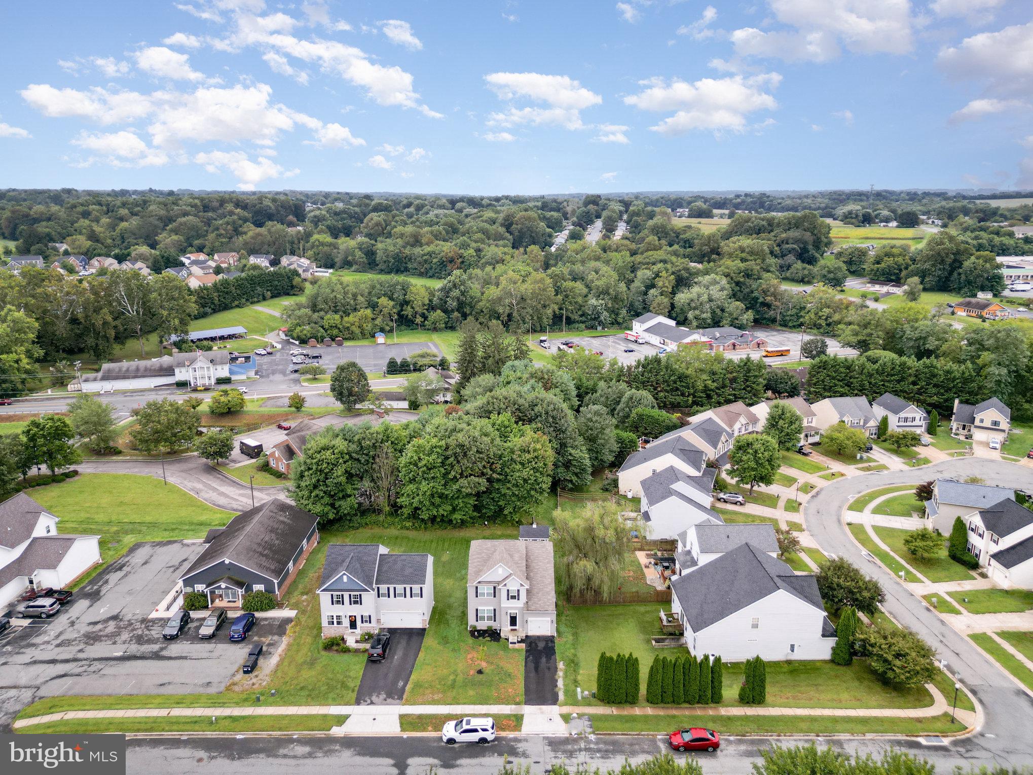 105 Maple Leaf Drive Rising Sun, MD 21911 - Photo 25 of 31 an aerial view of residential houses with outdoor space