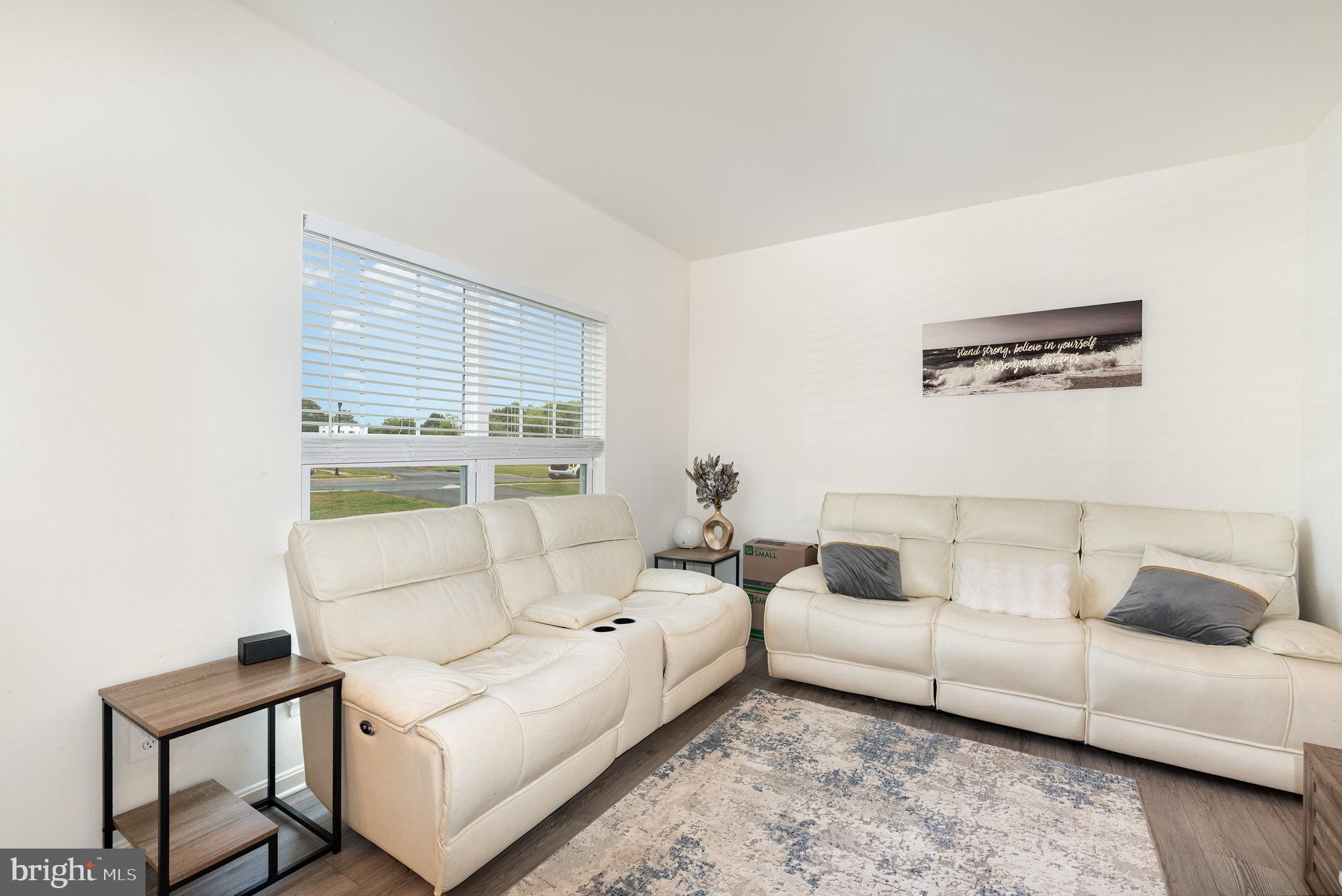 105 Maple Leaf Drive Rising Sun, MD 21911 - Photo 4 of 31 a living room with furniture and a window