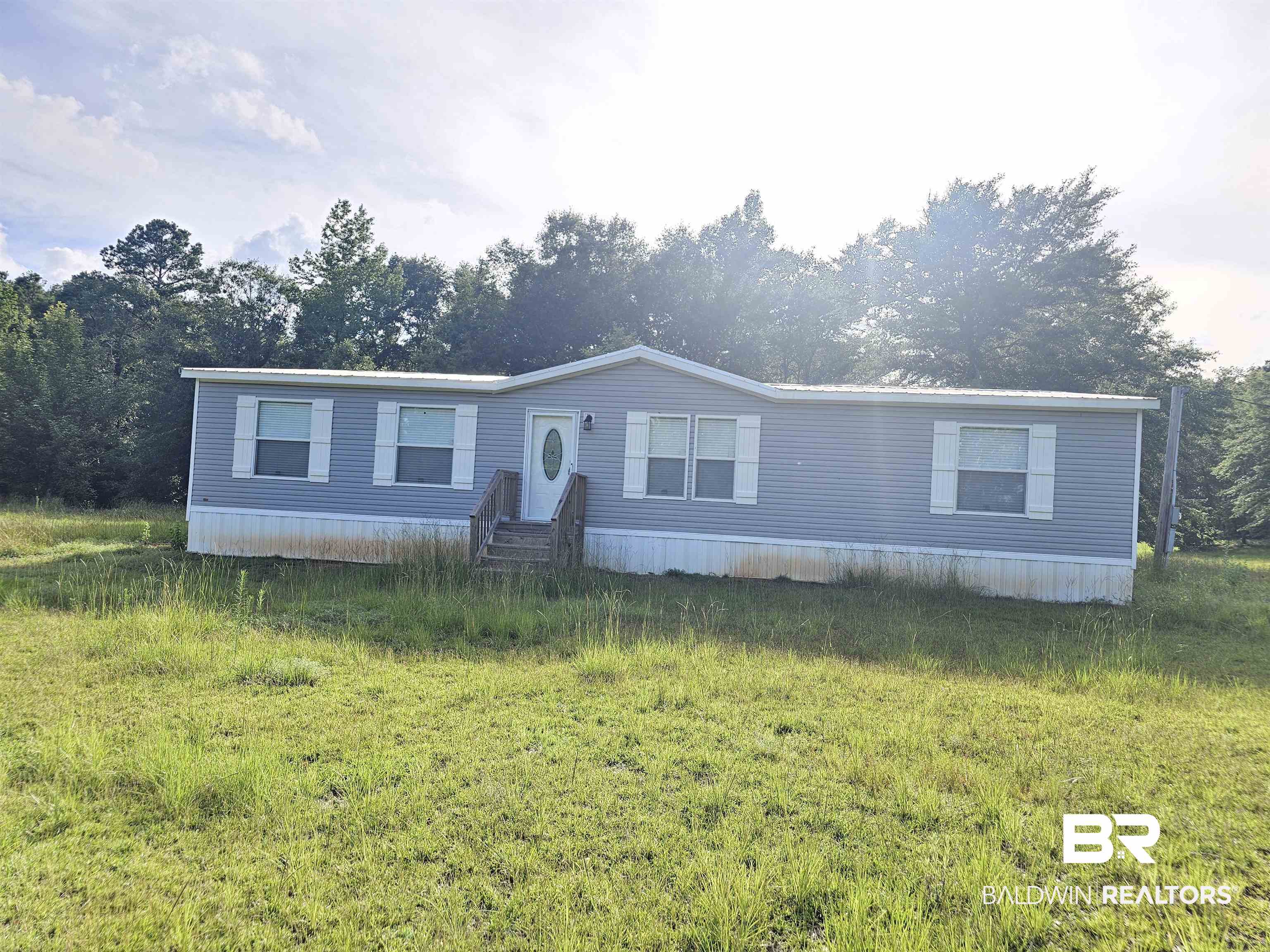 1863 Wait Road Monroeville, AL 36460 - Photo 29 of 38 Manufactured / mobile home with a front yard