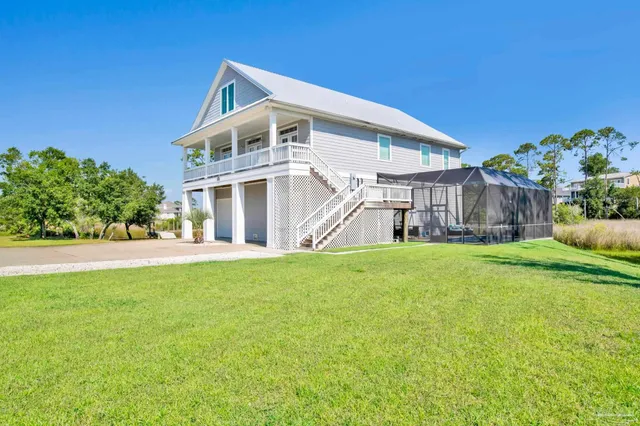 a front view of house with garden