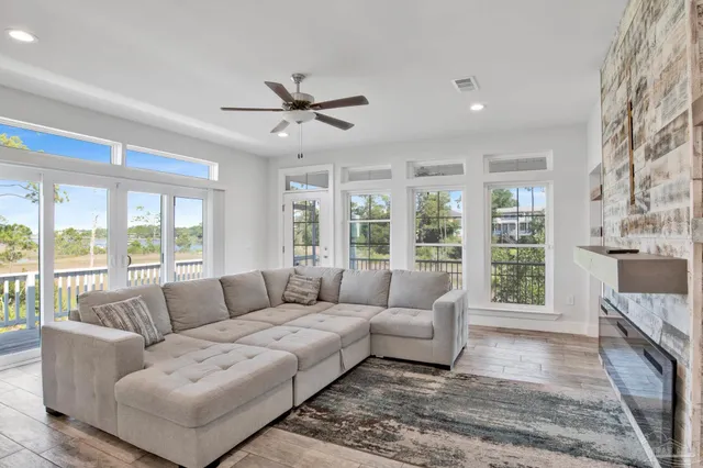 a kitchen with stainless steel appliances granite countertop a sink and a stove
