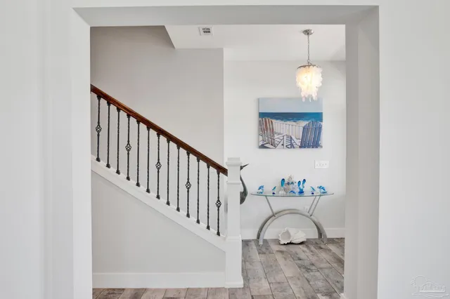 a view of entryway with wooden floor