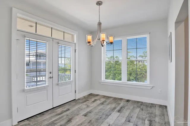 a view of cabinets and wooden floor