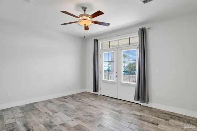 a bathroom with a granite countertop bathtub and shower