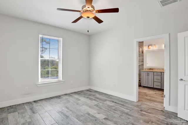 a bathroom with a bathtub and a sink