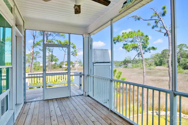 a view of a backyard of a house with a garden