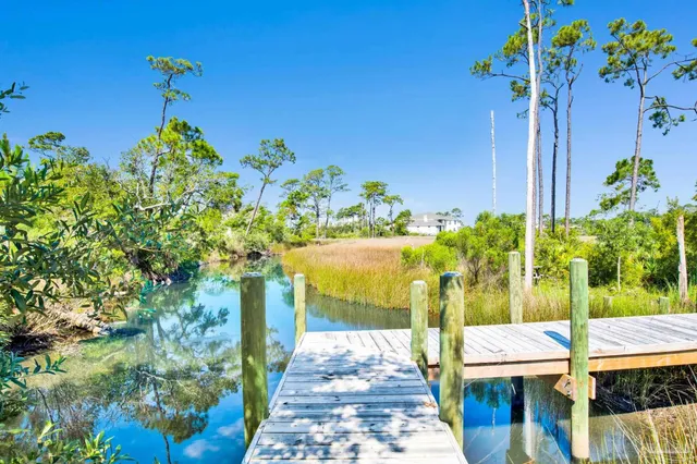 a kitchen with a large window and a table