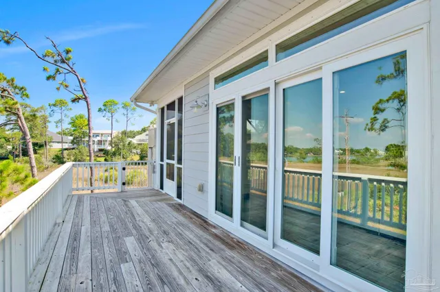 a living room with furniture windows and a fireplace