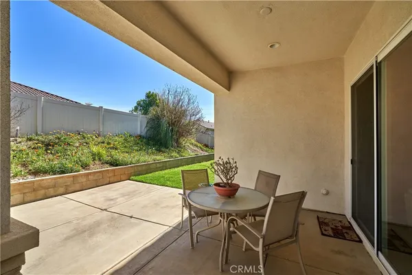 a work room with furniture and a window