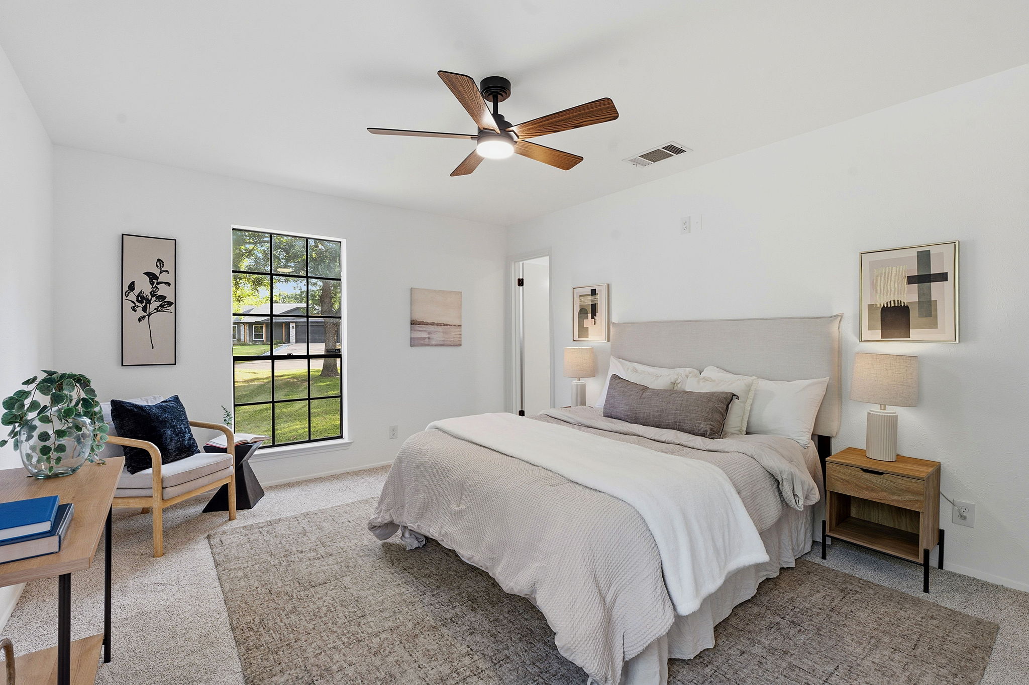 2702 Calabash Cove Austin, TX 78745 - Photo 28 of 40 a bedroom with a bed and window