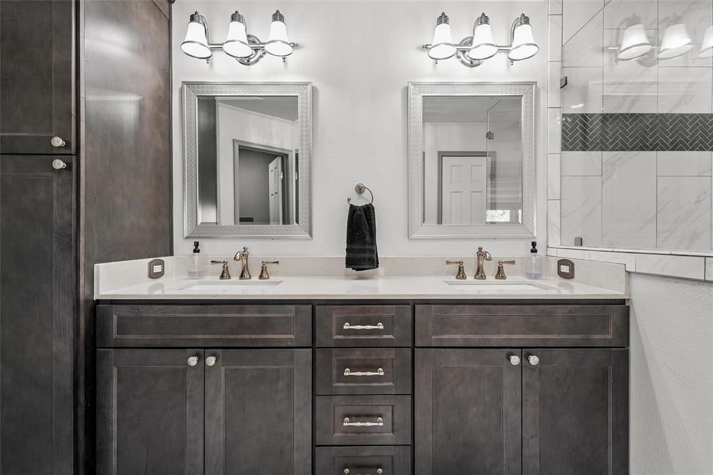 107 South Old Robinson Road Robinson, TX 76706 - Photo 21 of 39 Bathroom with double vanity and tiled shower