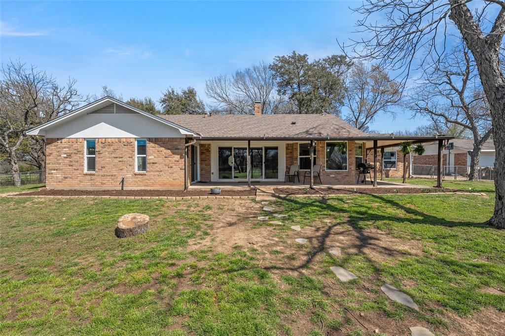 107 South Old Robinson Road Robinson, TX 76706 - Photo 37 of 39 Rear view of property with brick siding, a patio area, and a chimney