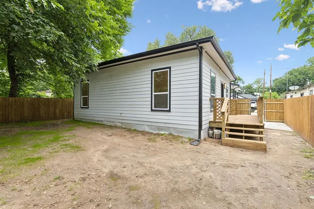 a view of an ocean and a yard