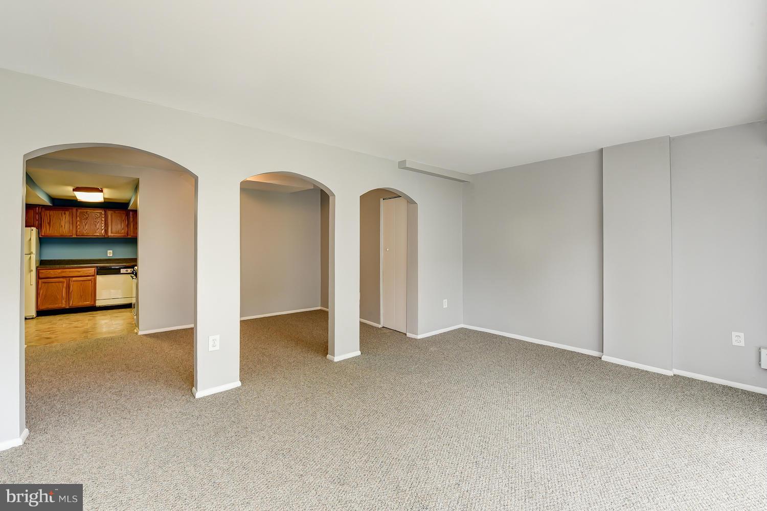 2360 Sun Valley Circle, Unit 2GH Silver Spring, MD 20906 - Photo 2 of 30 a view of an empty room and a windows
