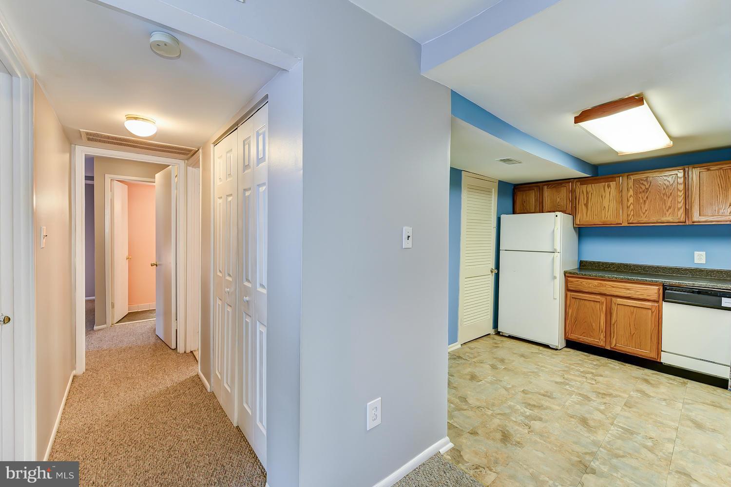2360 Sun Valley Circle, Unit 2GH Silver Spring, MD 20906 - Photo 11 of 30 a view of a kitchen with a sink and cabinets