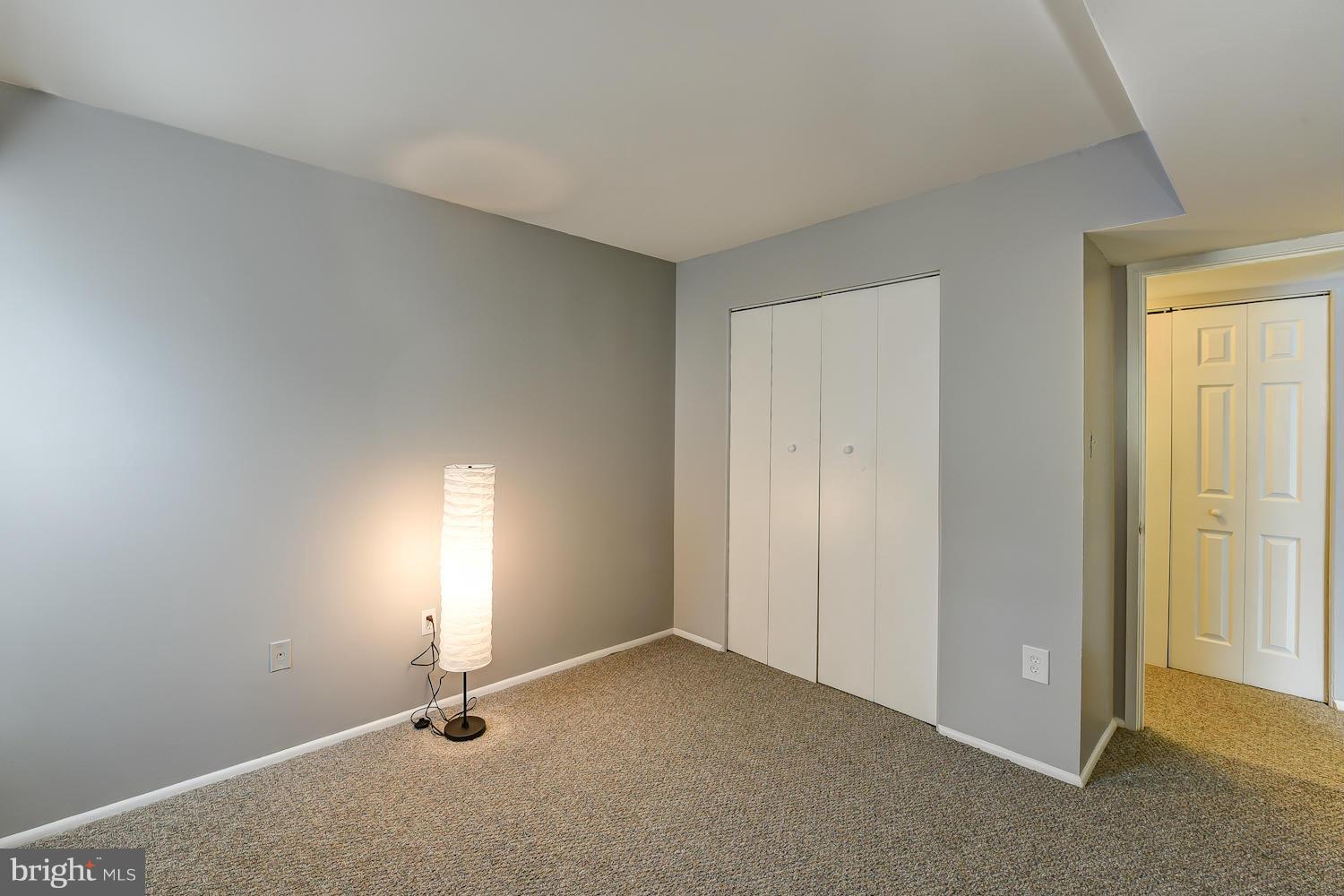 2360 Sun Valley Circle, Unit 2GH Silver Spring, MD 20906 - Photo 16 of 30 a view of an empty room and a window