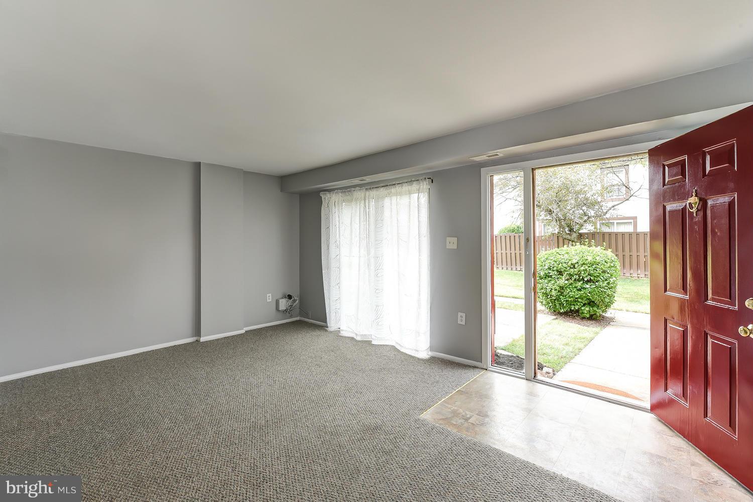 2360 Sun Valley Circle, Unit 2GH Silver Spring, MD 20906 - Photo 3 of 30 an empty room with windows