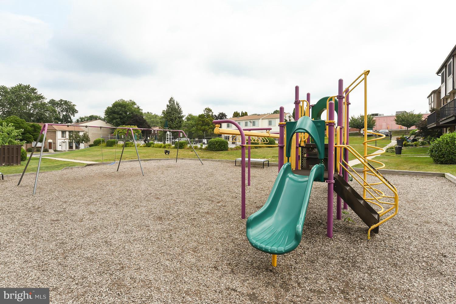 2360 Sun Valley Circle, Unit 2GH Silver Spring, MD 20906 - Photo 28 of 30 a view of a park with swings