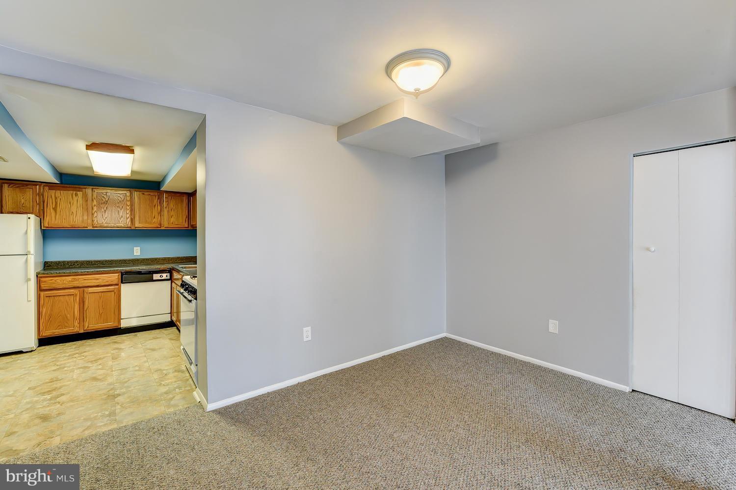 2360 Sun Valley Circle, Unit 2GH Silver Spring, MD 20906 - Photo 6 of 30 a view of a room with a kitchen