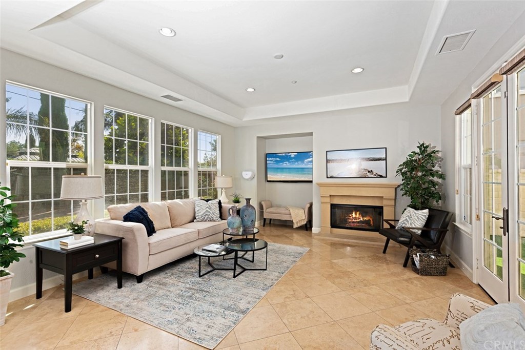 720 West Aster Place Santa Ana, CA 92706 - Photo 11 of 41 a living room with furniture and a fireplace